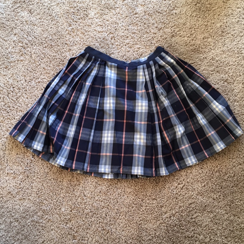 checked pleated skirt from silence + noise
